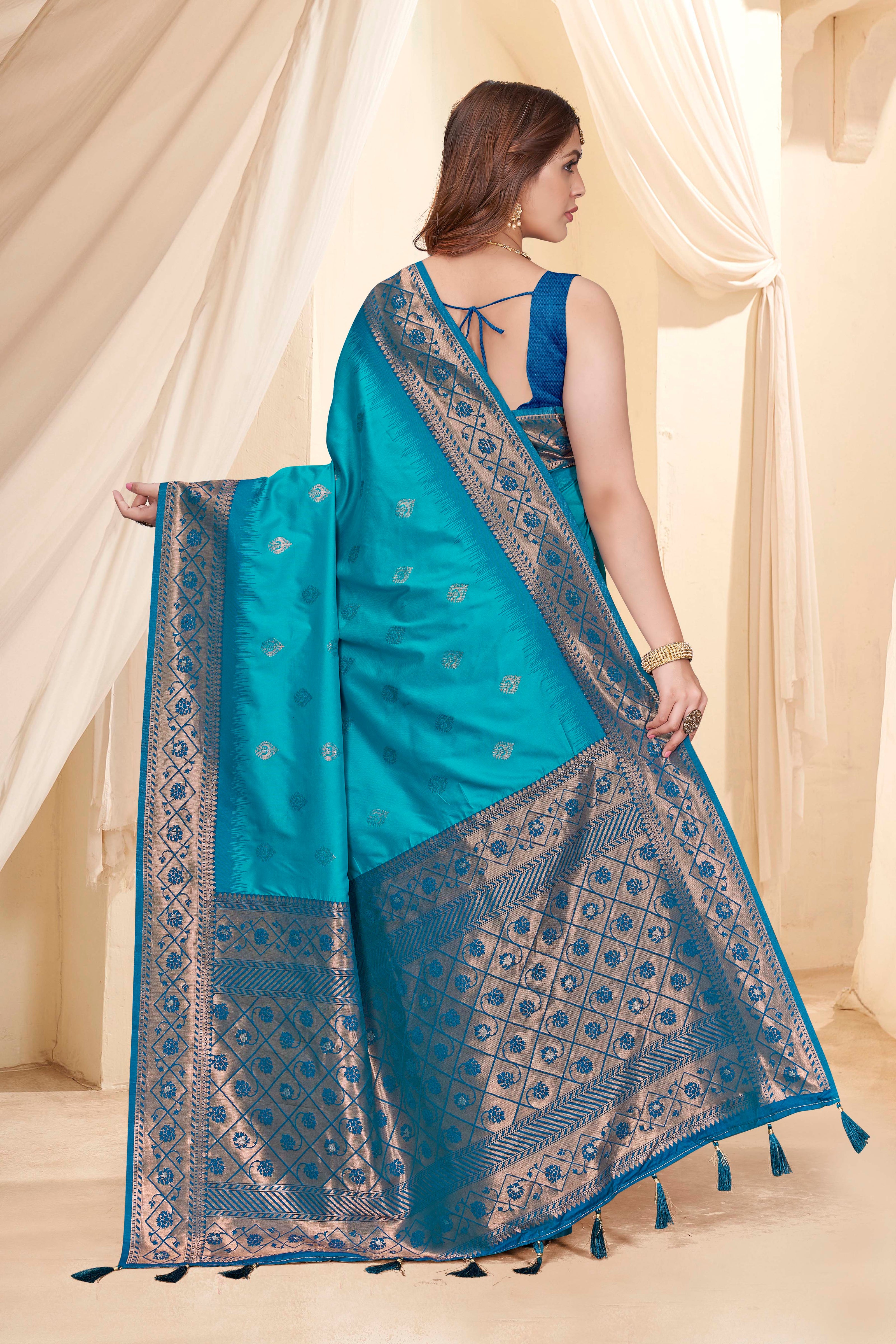 Cyan Blue Soft Silk Floral Border Contrast Zari Woven Saree