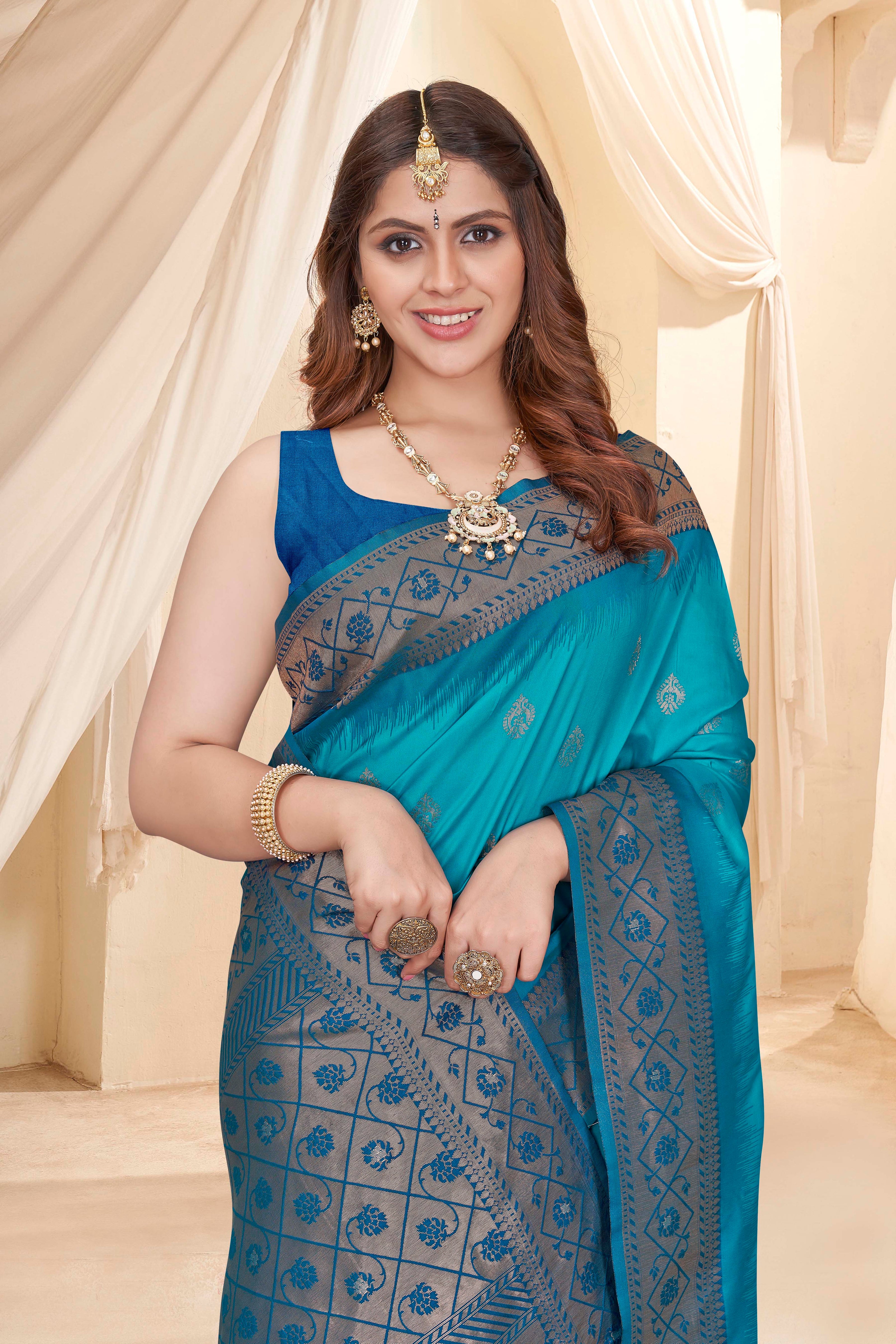 Cyan Blue Soft Silk Floral Border Contrast Zari Woven Saree