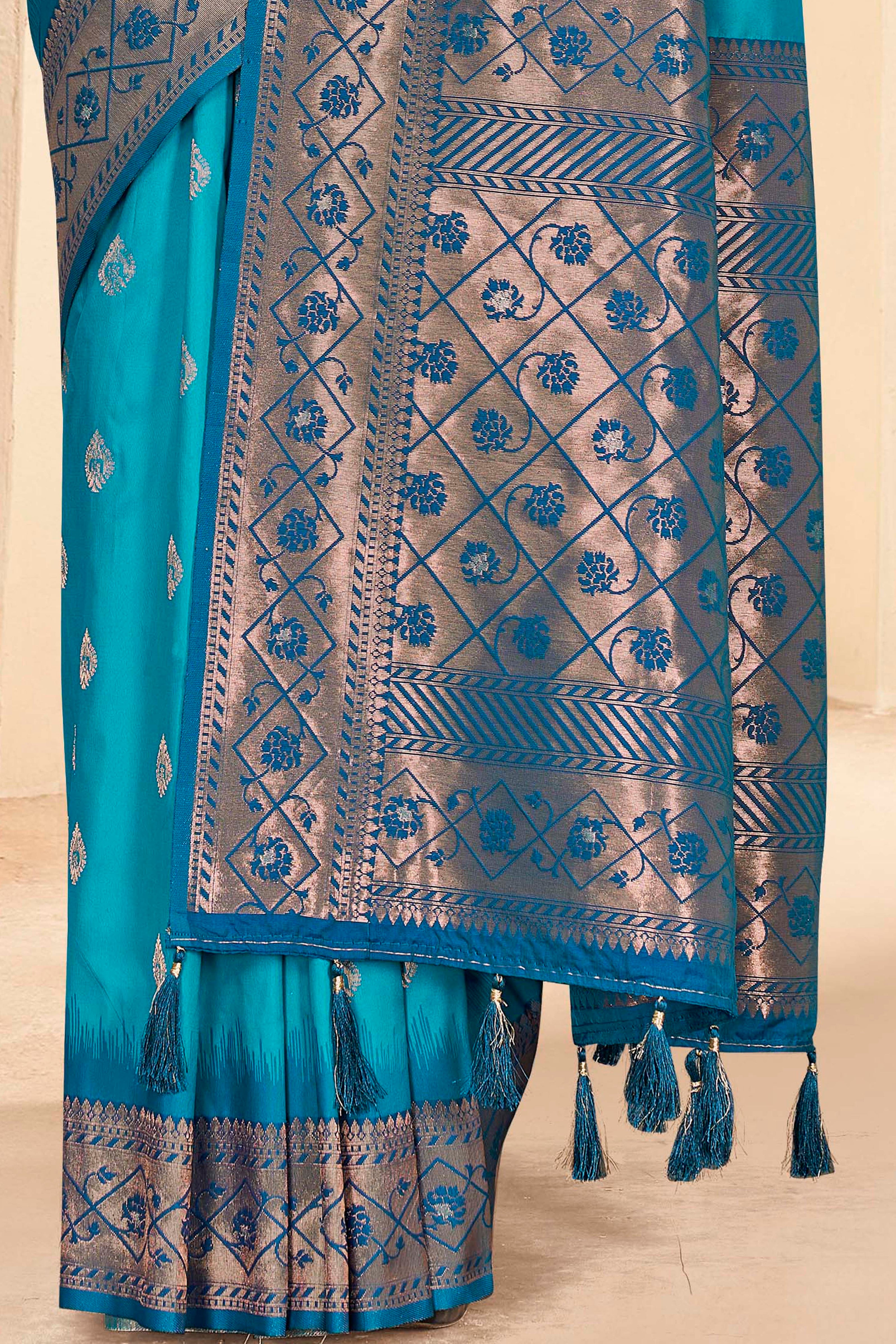 Cyan Blue Soft Silk Floral Border Contrast Zari Woven Saree
