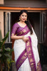 Fascinating Off White And Purple Silk Saree