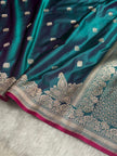 Peacock Teal Banarasi Silk Saree with Silver Zari Border & Contrast Magenta Accent