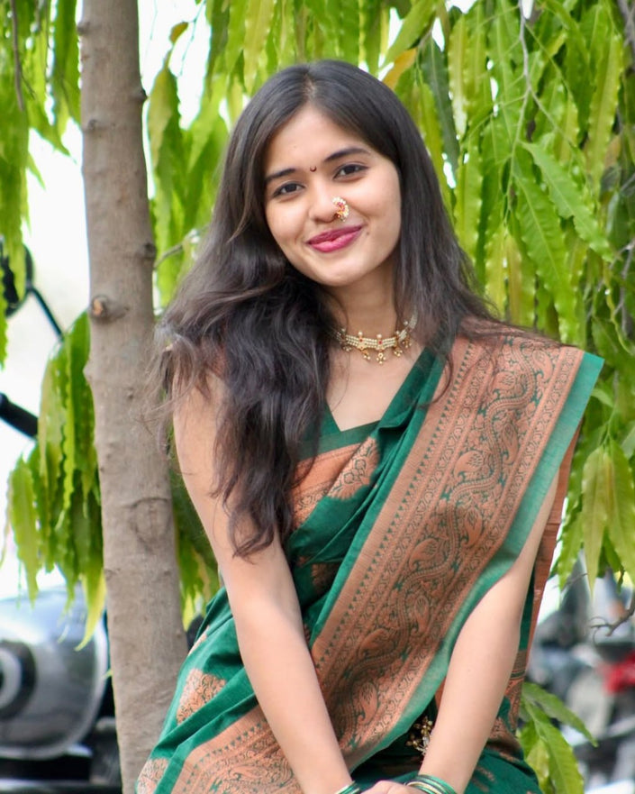 Kanjee – green Banarasi Soft Silk Saree with Elegant Minimal Weaving