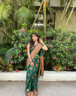 Kanjee – green Banarasi Soft Silk Saree with Elegant Minimal Weaving