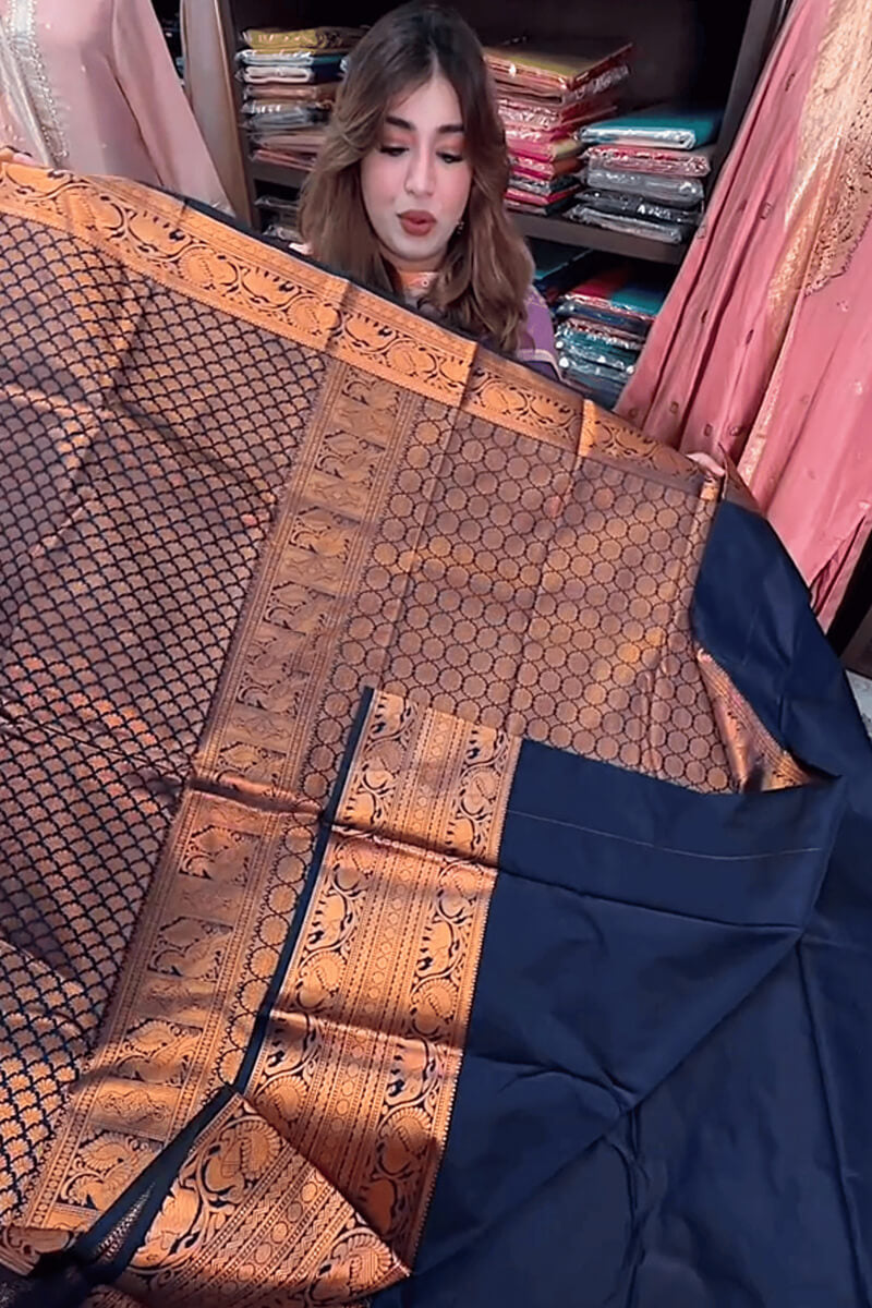 Surreptitious Navy Blue Soft Banarasi Silk Saree With Unique Blouse Piece