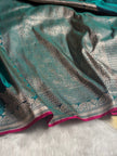 Peacock Teal Banarasi Silk Saree with Silver Zari Border & Contrast Magenta Accent