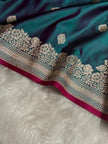 Peacock Teal Banarasi Silk Saree with Silver Zari Border & Contrast Magenta Accent