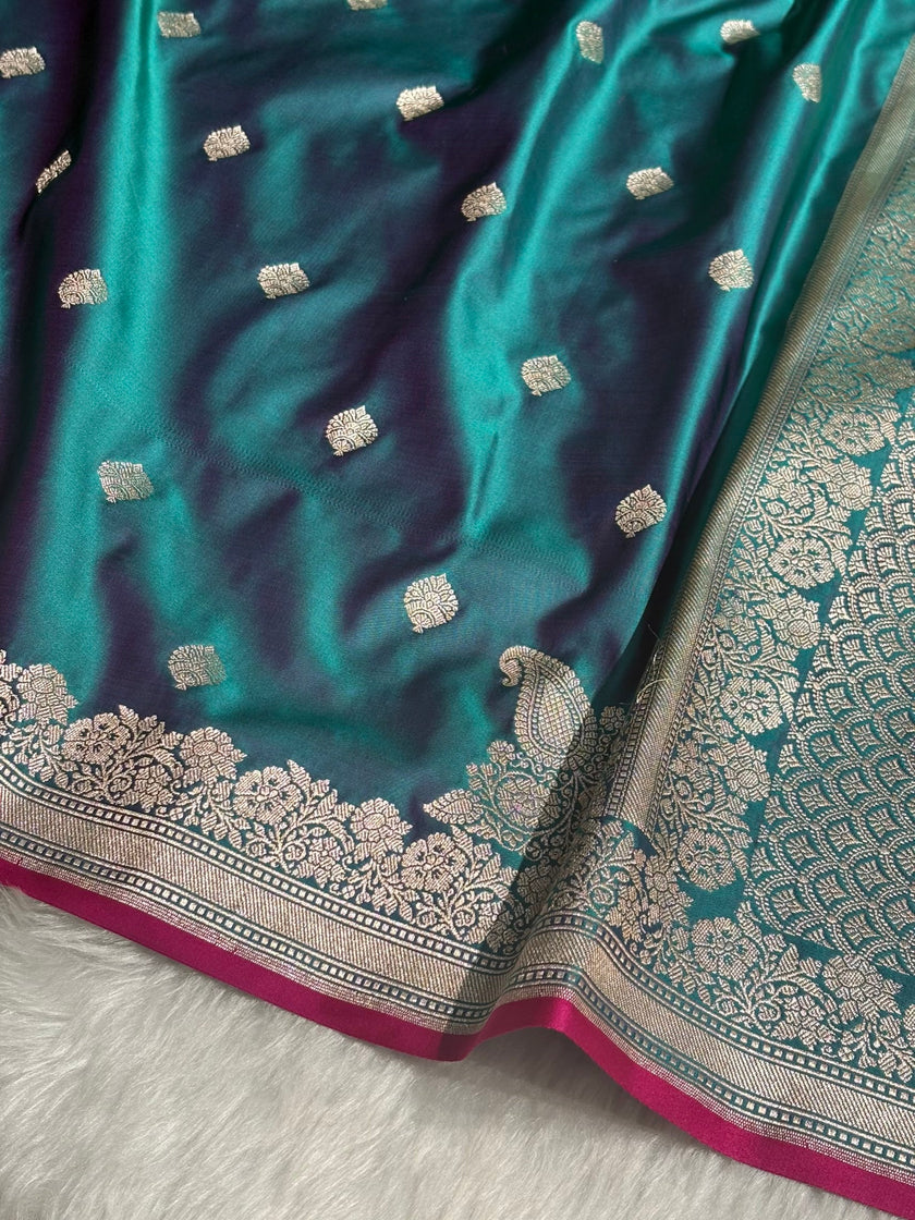 Peacock Teal Banarasi Silk Saree with Silver Zari Border & Contrast Magenta Accent