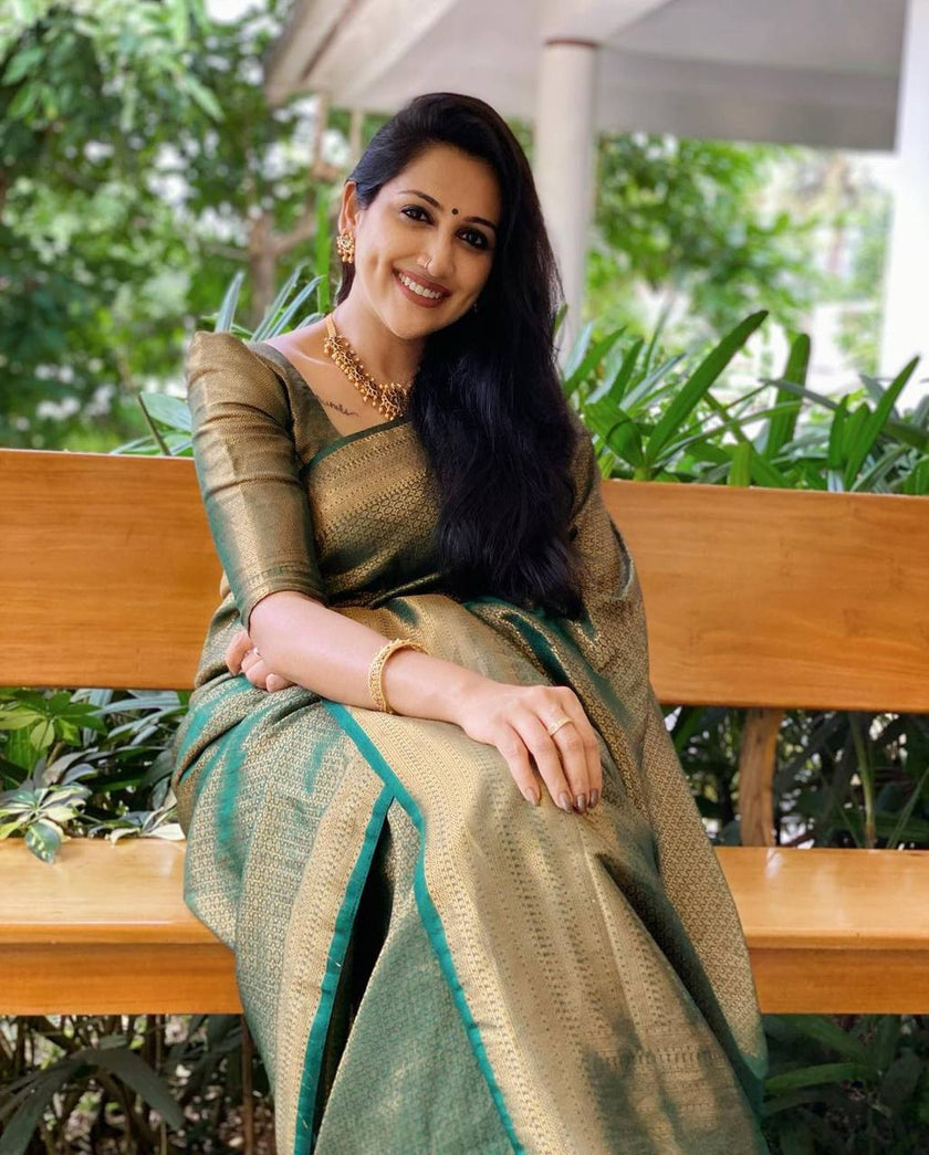 Mitera Green Woven Designer Party Wear Soft Silk  Lichi Silk Saree .