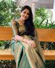 Mitera Green Woven Designer Party Wear Soft Silk  Lichi Silk Saree .
