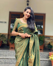 Mitera Green Woven Designer Party Wear Soft Silk  Lichi Silk Saree .
