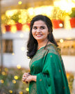 Emerald Green Banarasi Silk Saree with Antique Gold Zari Border and Matching Blouse