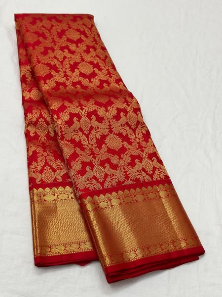 Imperial Red Banarasi Silk Saree with Grand Peacock & Floral Zari Weave