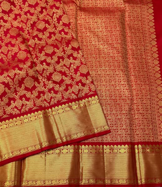 Imperial Red Banarasi Silk Saree with Grand Peacock & Floral Zari Weave