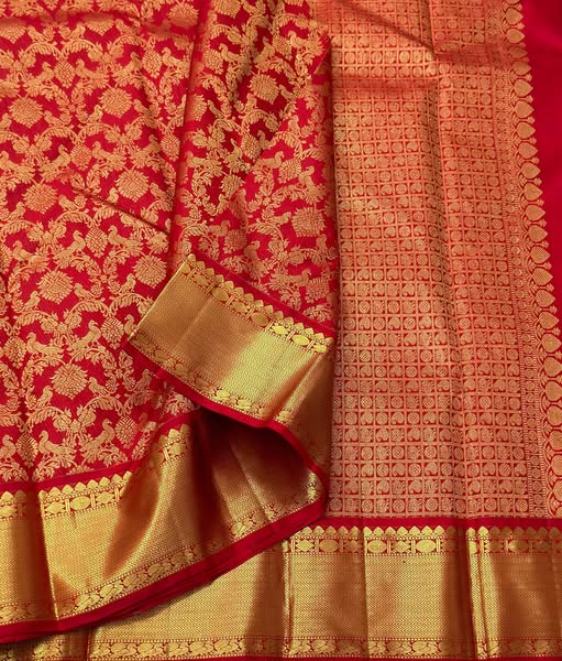 Imperial Red Banarasi Silk Saree with Grand Peacock & Floral Zari Weave