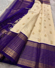 Ivory Pearl Banarasi Silk Saree with Royal Blue Antique Zari Border