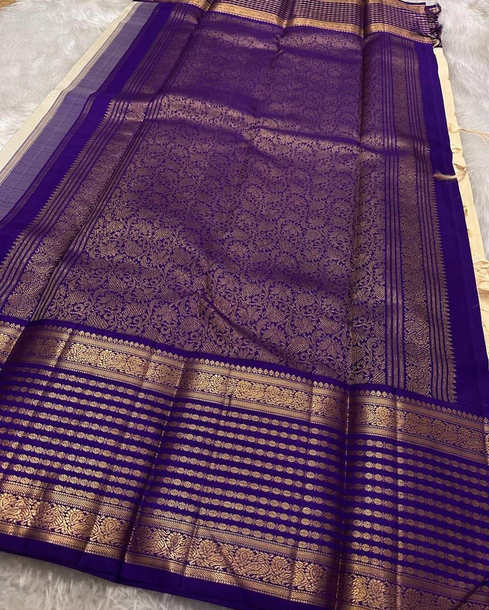 Ivory Pearl Banarasi Silk Saree with Royal Blue Antique Zari Border