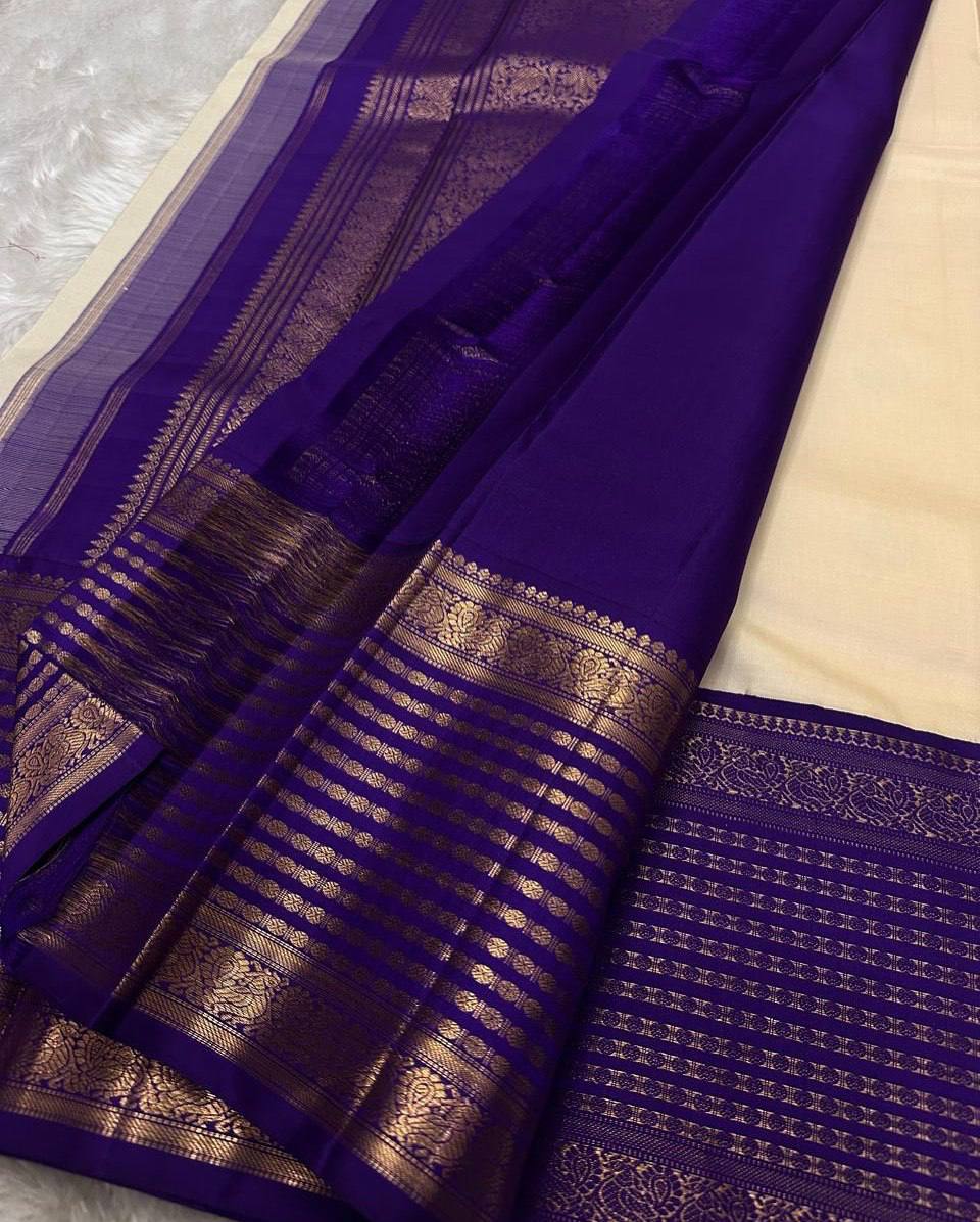 Ivory Pearl Banarasi Silk Saree with Royal Blue Antique Zari Border