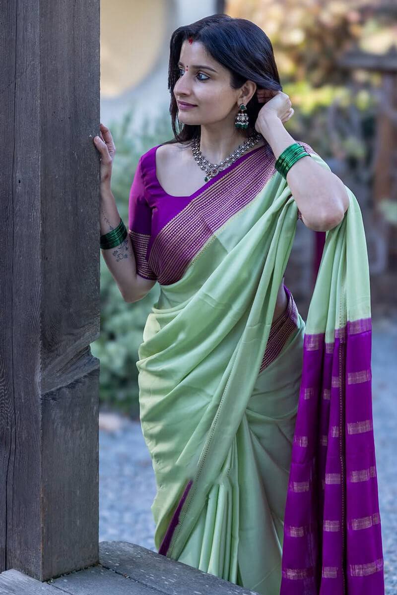 Mint Aura Banarasi Silk Saree with Royal Purple Zari Border