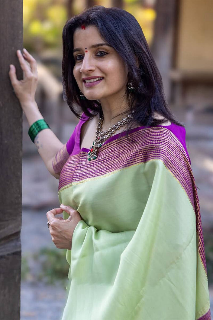 Mint Aura Banarasi Silk Saree with Royal Purple Zari Border