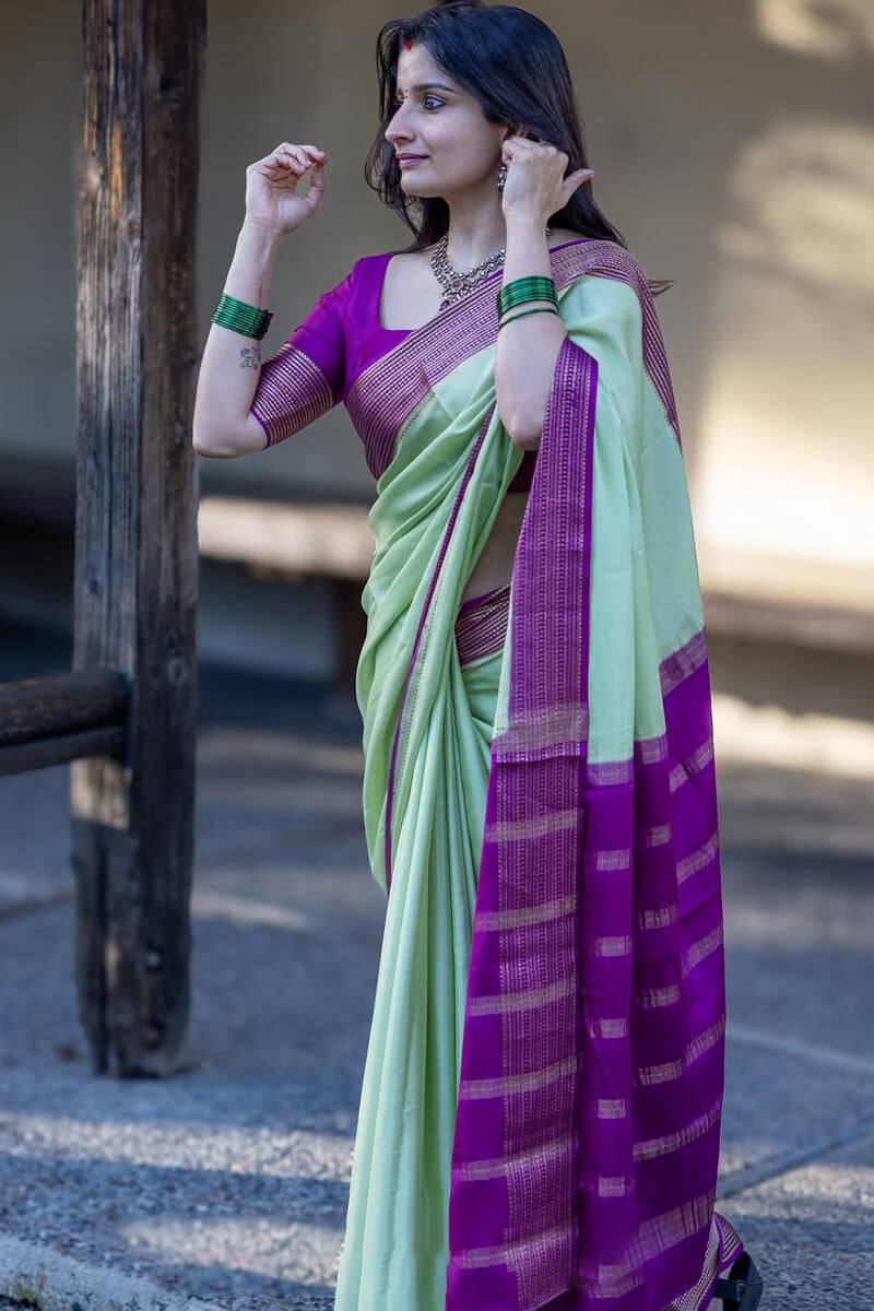 Mint Aura Banarasi Silk Saree with Royal Purple Zari Border