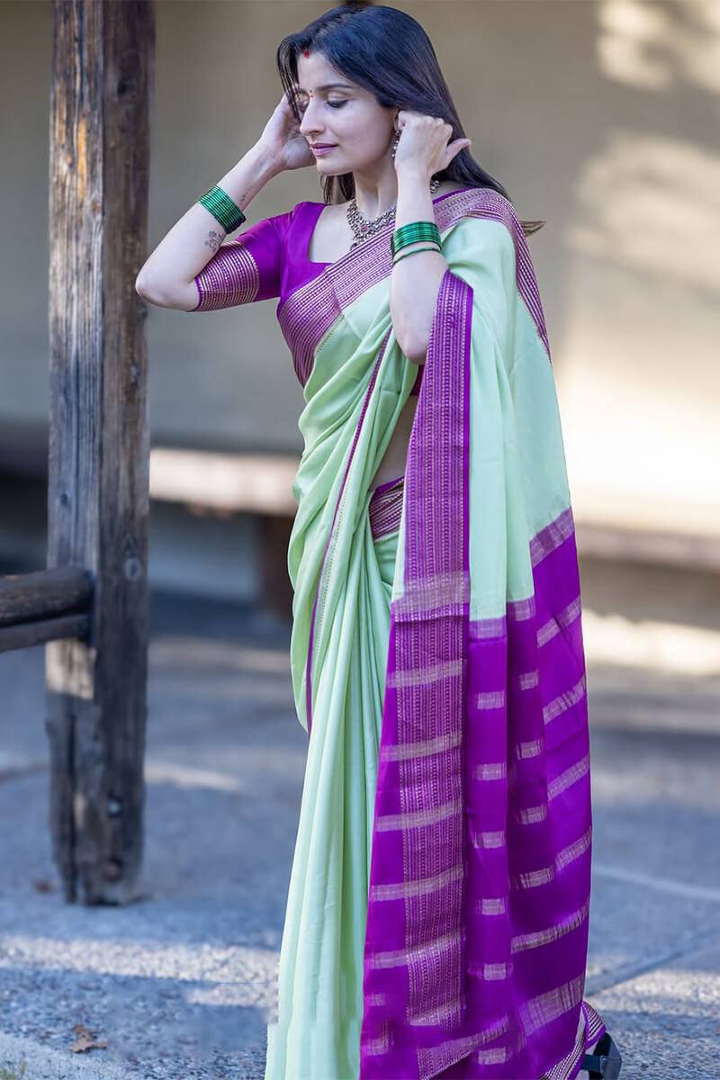 Mint Aura Banarasi Silk Saree with Royal Purple Zari Border