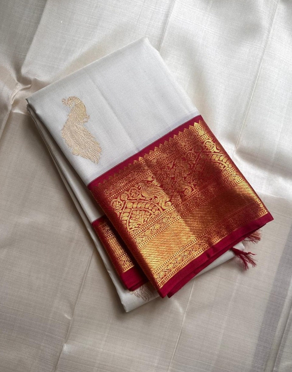 Luxury White Kanjivaram Silk Saree with Magenta Pink Temple Border & Rich Gold Zari Weaving