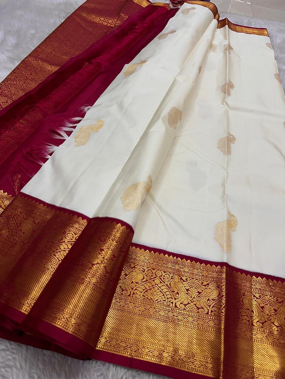 Luxury White Kanjivaram Silk Saree with Magenta Pink Temple Border & Rich Gold Zari Weaving