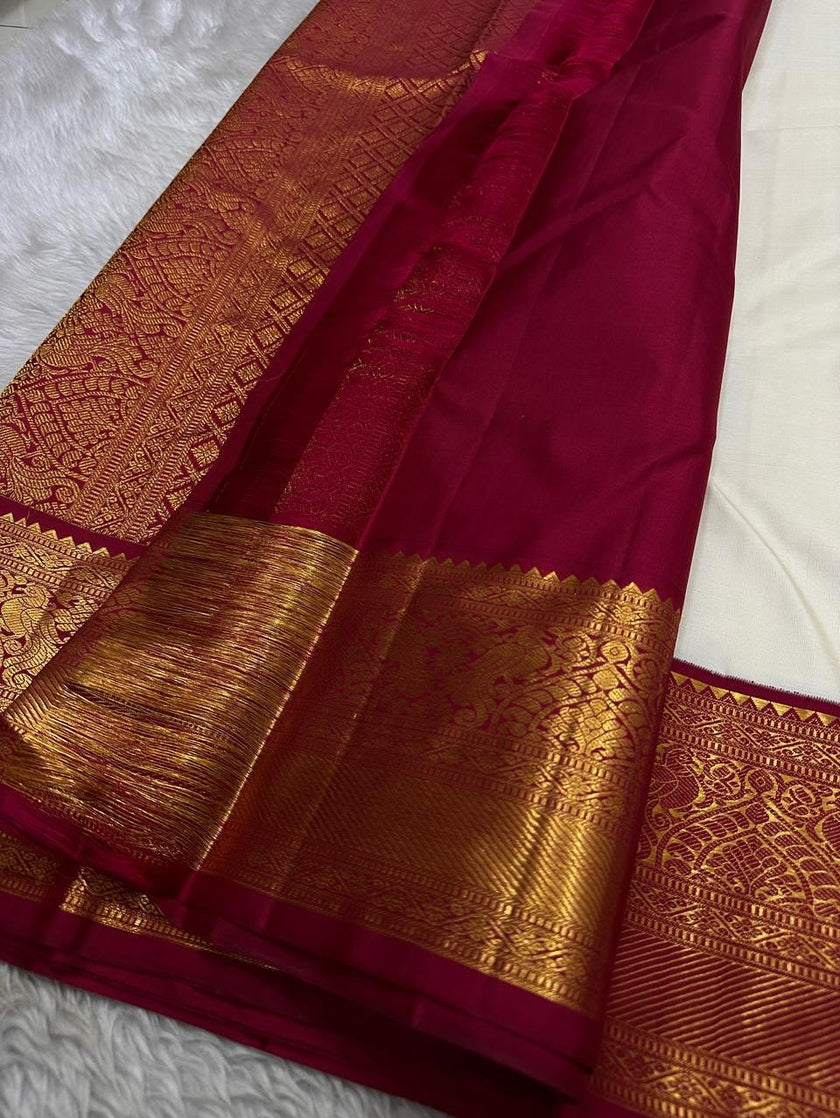 Luxury White Kanjivaram Silk Saree with Magenta Pink Temple Border & Rich Gold Zari Weaving