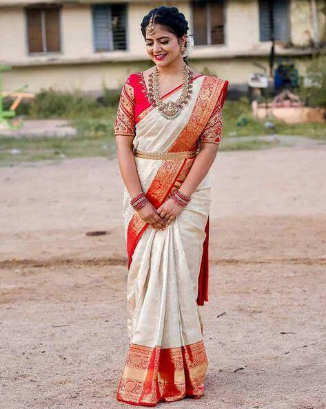 Traditional Off White Kanjivaram Silk Saree with Red Contrast Border & Rich Gold Zari Weaving