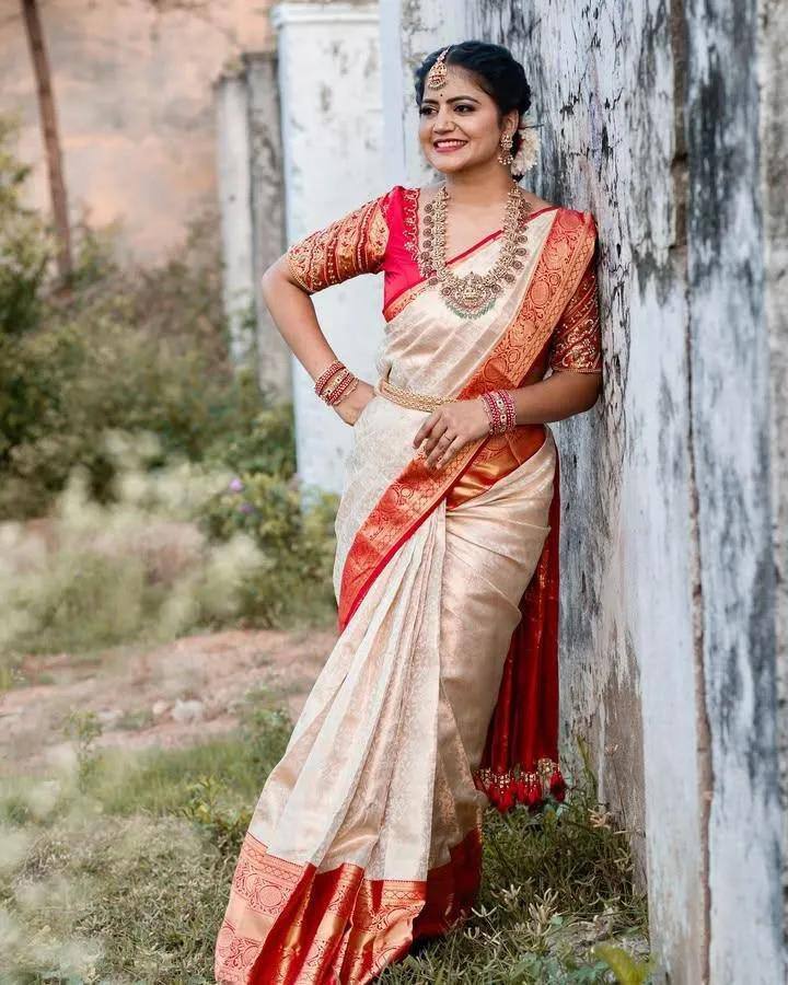 Traditional Off White Kanjivaram Silk Saree with Red Contrast Border & Rich Gold Zari Weaving