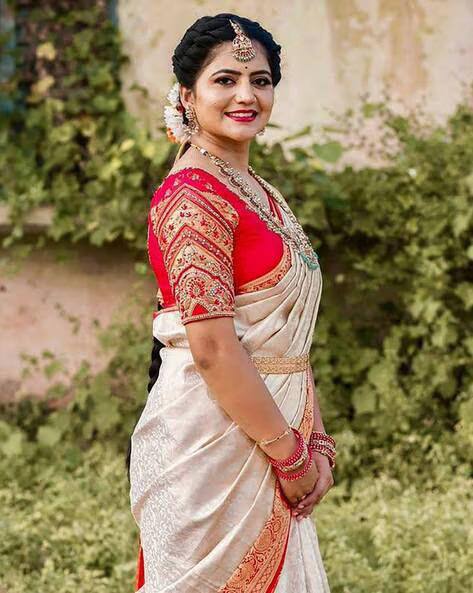 Traditional Off White Kanjivaram Silk Saree with Red Contrast Border & Rich Gold Zari Weaving
