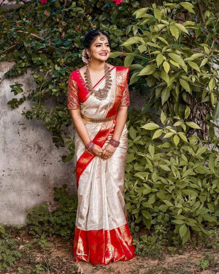 Traditional Off White Kanjivaram Silk Saree with Red Contrast Border & Rich Gold Zari Weaving