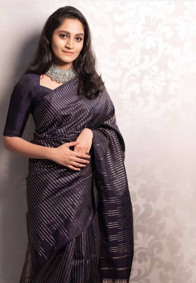 Designer Black Satin Silk Saree with Metallic Striped Weaving & Elegant Modern Drape