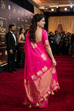 Celebrity Style Hot Pink Banarasi Silk Saree with Gold Zari Peacock Motifs