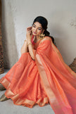 Sunset Peach Banarasi Silk Saree with Golden Zari Border