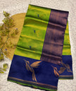 Elegant Green Banarasi Silk Saree with Navy Blue Zari Border & Leaf Motifs