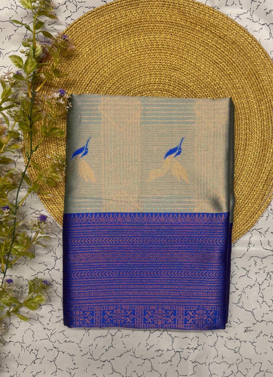 Elegant Mint Green Banarasi Silk Saree with Royal Blue Pallu & Floral Weave