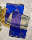 Elegant Mint Green Banarasi Silk Saree with Royal Blue Pallu & Floral Weave