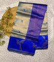Elegant Mint Green Banarasi Silk Saree with Royal Blue Pallu & Floral Weave
