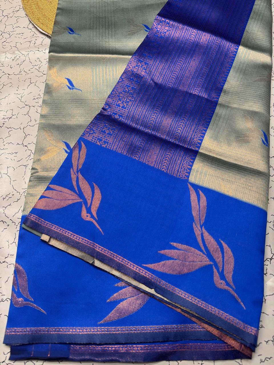 Elegant Mint Green Banarasi Silk Saree with Royal Blue Pallu & Floral Weave
