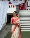Elegant Ivory Silk Saree with Floral Zari Motifs & Red Woven Border