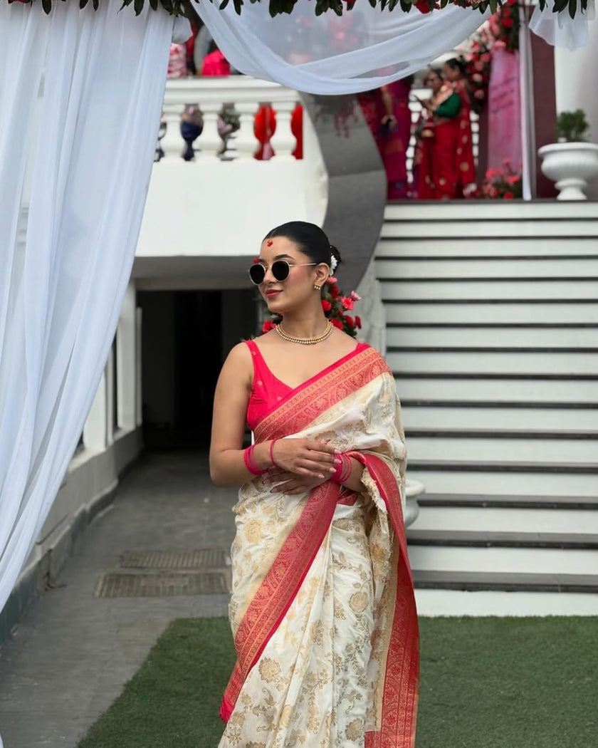 Elegant Ivory Silk Saree with Floral Zari Motifs & Red Woven Border