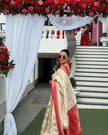 Elegant Ivory Silk Saree with Floral Zari Motifs & Red Woven Border