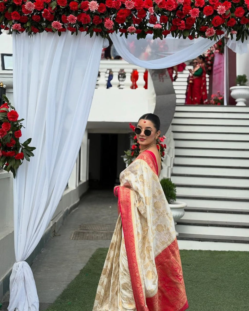 Elegant Ivory Silk Saree with Floral Zari Motifs & Red Woven Border