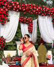 Elegant Ivory Silk Saree with Floral Zari Motifs & Red Woven Border
