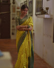 Lime Yellow Woven Silk Saree with Green Zari Border