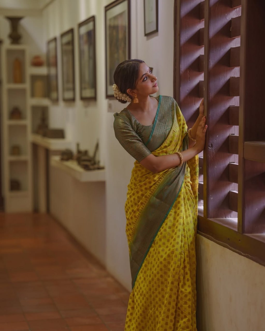 Lime Yellow Woven Silk Saree with Green Zari Border