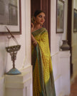 Lime Yellow Woven Silk Saree with Green Zari Border