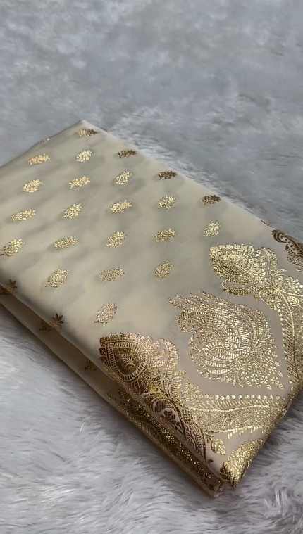 Ivory Banarasi Silk Saree with Golden Zari Buttas & Rich Paisley Border
