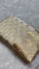 Ivory Banarasi Silk Saree with Golden Zari Buttas & Rich Paisley Border